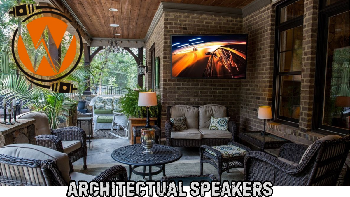 Architectural speakers integrated into a covered outdoor living room