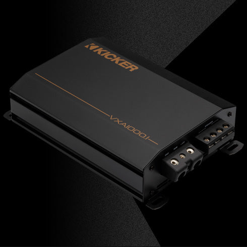 KICKER VXA1000.1 amplifier with rugged black enclosure and logo visible on top.