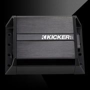 Top view of rugged KICKER PX amplifier with black aluminum casing and side mounting brackets.