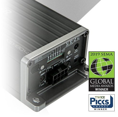 Close-up of KICKER KEY2004ISO amplifier control panel, shown with 2019 SEMA Global Media Award and TWICE Picks Awards logos.
