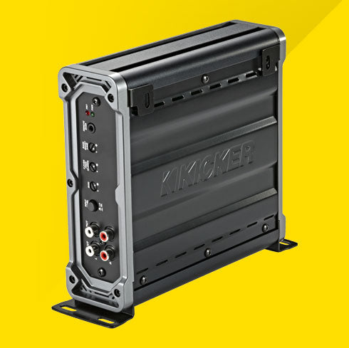 Side view of vertically mounted KICKER CXA400.1 car amplifier showing control panel and RCA inputs.