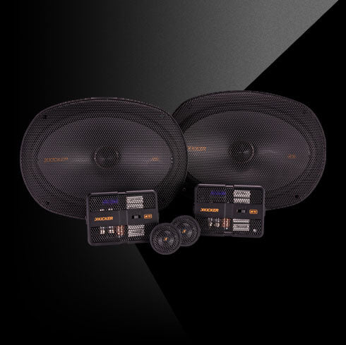 KICKER KS-Series 6x9-inch component speaker system with woofers, tweeters, and compact crossover networks.