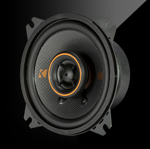 KICKER KSC40 4-inch coaxial speaker with black polypropylene cone, orange-trim tweeter, and thin-mount design.